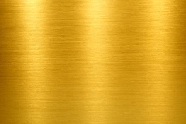 Gold shining texture background gold brushed metal texture or background gold leaf metal photos stock pictures, royalty-free photos & images