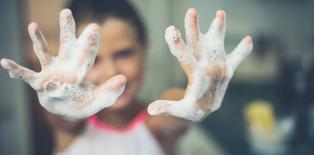 I like my hands always to be clean. I like my hands always to be clean. Hands of a little girl of foam. Close up. Copy space. Focus is on hands. 9 stock pictures, royalty-free photos & images