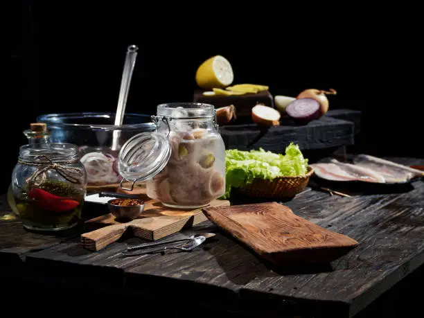 Serving rollmops, traditional European herring snack