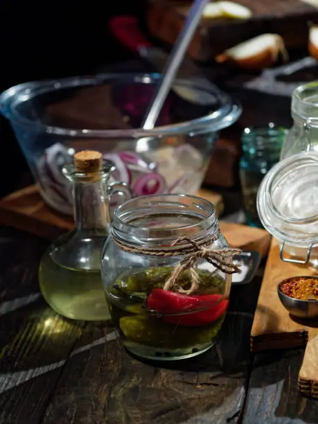 Preparing homemade rollmops, traditional European herring snack