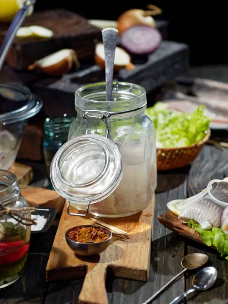 Serving rollmops, traditional European herring snack