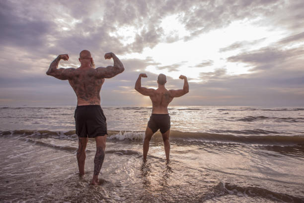 istock Tattooed Senior Man coaching young man During Workout 1074177136