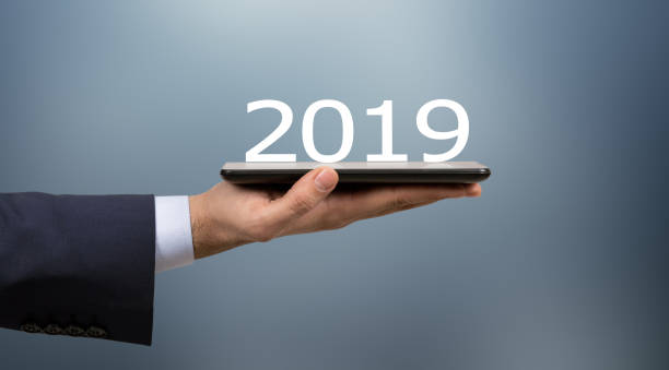 istock New Year 2019 Finance Concepts over Human Hand 1074178384