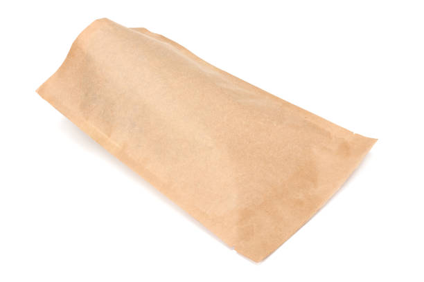 istock kraft paper bag isolated on white background 1074184396