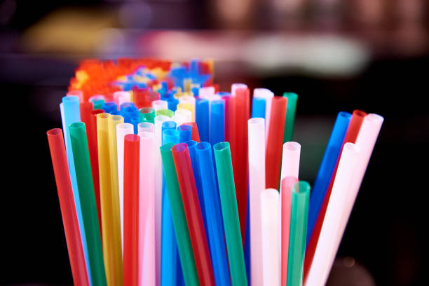 istock Bright multicolored straws for cocktails close-up. 1074188350