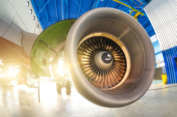 istock Opened hood aircraft engine in the hangar. 1074190260