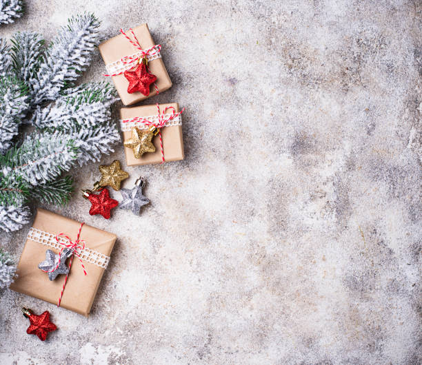 istock Christmas gift boxes in craft paper 1074193990