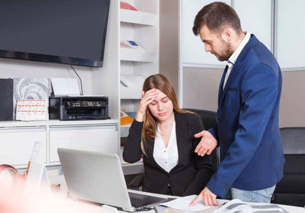 istock Manager scolding frustrated salesgirl 1074194370