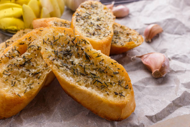 istock fragrant garlic bread on a rustic wooden background 1074194972