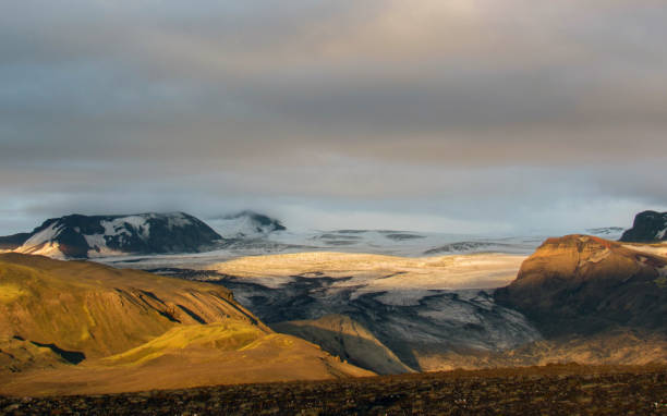 istock Stunning sunset with and Myrdalsjokull glacier, Katla caldera, Botnar-Ermstur, Laugavegur Trail, southern Iceland 1074195708