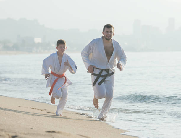 istock coach and boy in a kimono run 1074199626