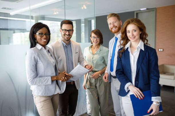 istock Group portrait of successful office team 1074203300