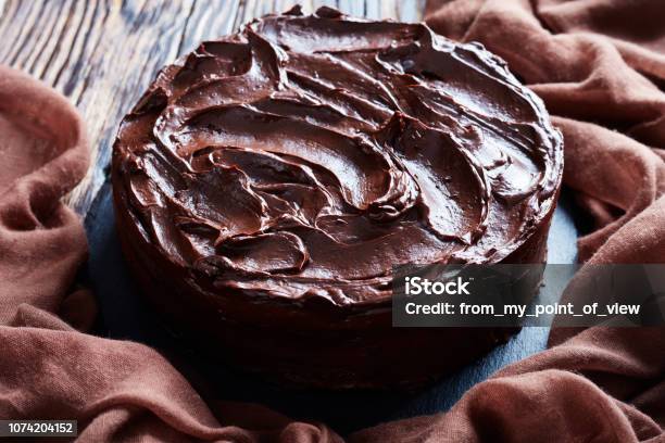 Closeup Of A Homemade Chocolate Cake Stock Photo - Download Image Now - Chocolate Cake, Backgrounds, Cake