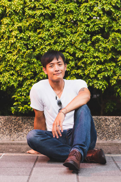 istock Portrait of handsome young man 1074205426