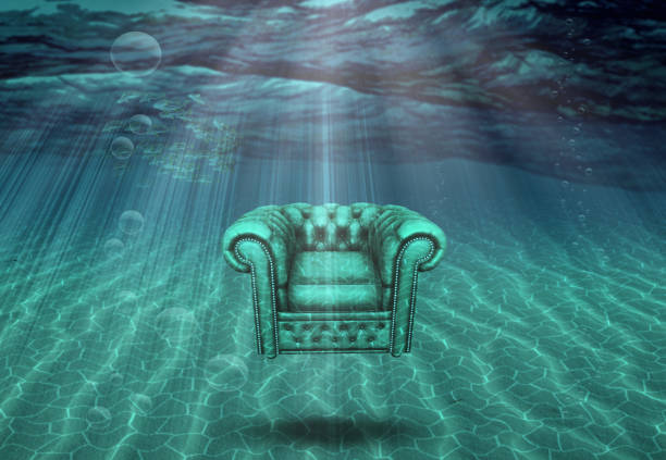 istock Arm chair floats above sea bottom 1074208866