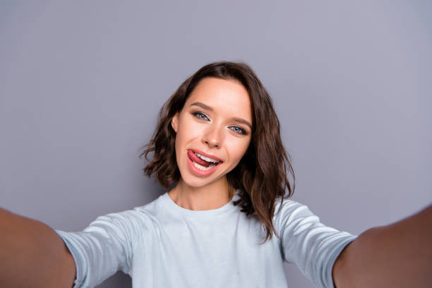 istock Glad positive optimist cheerful charming lady in casual wear wit 1074209250
