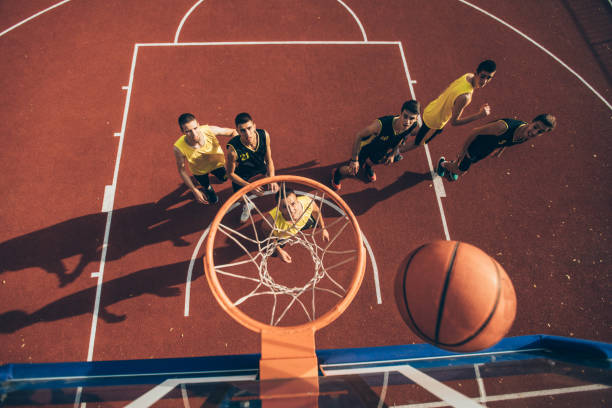 istock Men streetball match 1074210564