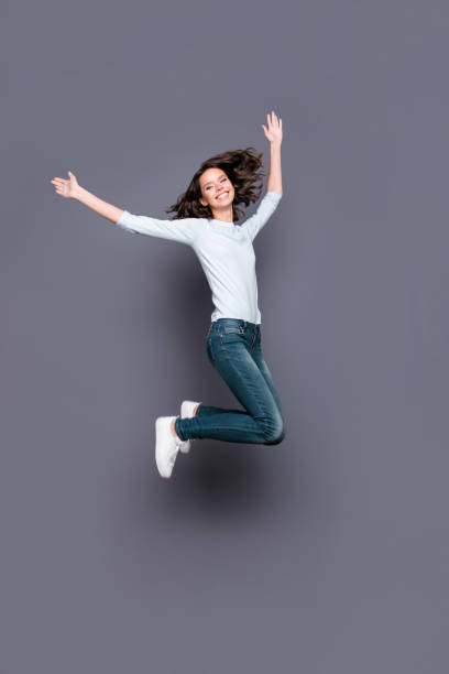 istock Full legs body size vertical half turn movement action gorgeous 1074211088