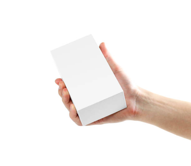 istock Hand holding white box. Close up. Isolated on white background. 1074211542