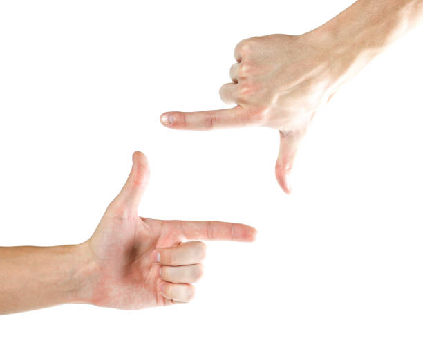 istock Hands shaped in viewfinder or frame. Isolated on white background. 1074211578