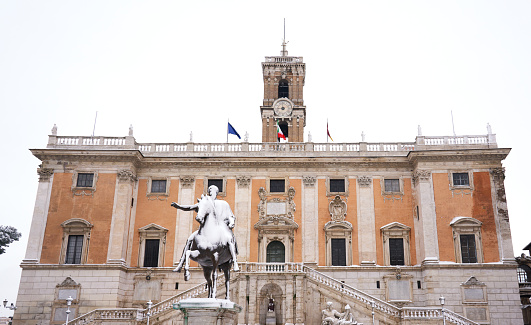 Statue of Marcus Aurelius in front of Rome Town Hall during the rare blizzard February 26. 2018, Rome Italy - this statue is a replica