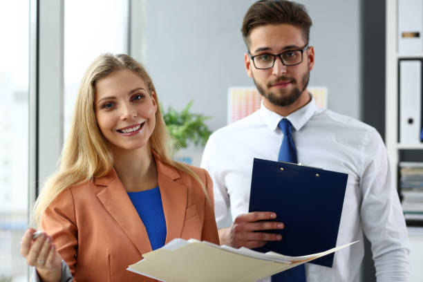 istock Group of modern businesspeople in office debate 1074222214