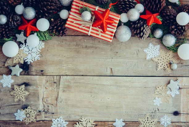 istock Christmas background with gift boxes and decorations on the wood 1074222432