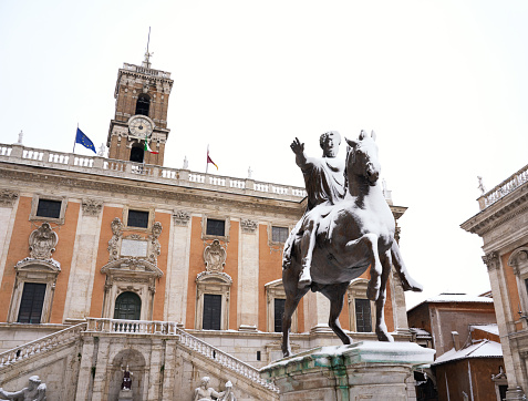 Venice, VE, Italy - February 13, 2024: bell tower of Saint George Basilica with winged lion symbol of VENEZIA ITALIA
