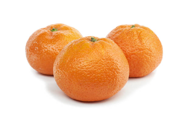 istock tangerine juicy ripe fruit on a white background 1074227828