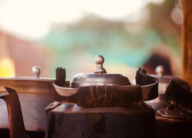istock Metallic tea kettles unique photo 1074231942