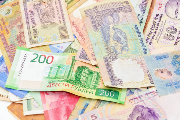 istock Cash money from different countries background 1074234816
