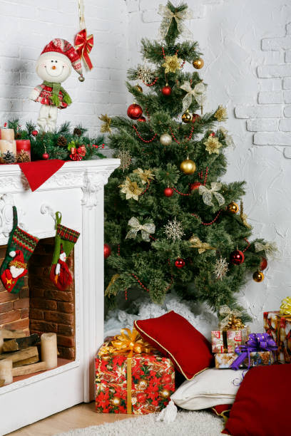 istock Image of chimney and decorated Christmas tree with gift 1074239434