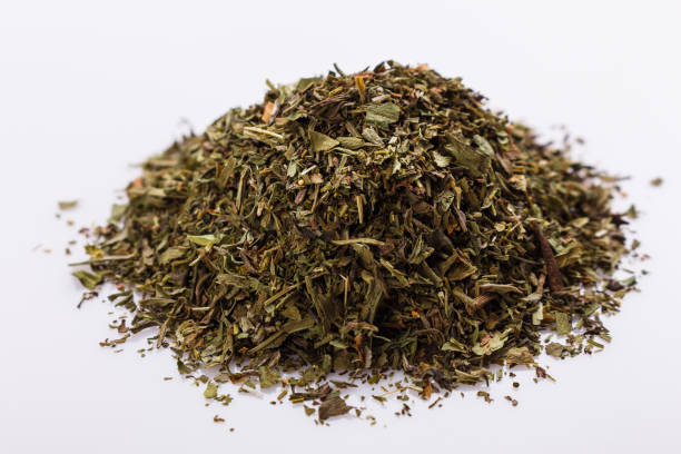 istock dried tarragon and essential oil on a white background 1074239466
