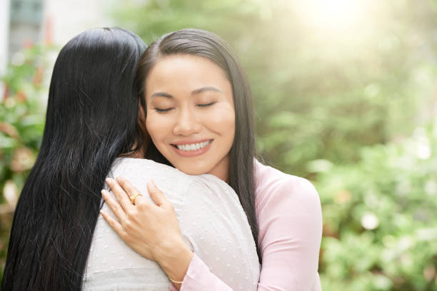 istock Beautiful embracing woman with mother 1074239976