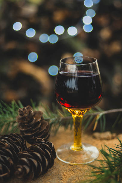 istock Glass of wine on log 1074243106