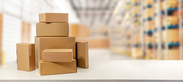 cardboard boxes in warehouse ready for transportation and delivery. copy space