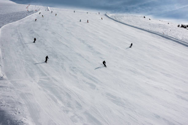 istock skiers on slope skiing 1074254784
