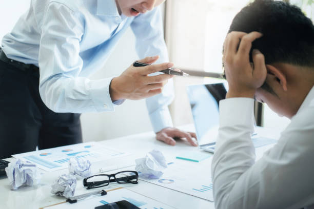 istock Business teamwork blaming partner and serious discussion. 1074257766