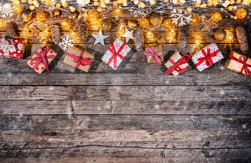 Decorative Christmas rustic background on wooden planks. Celebration and holiday concept. Free space for text.