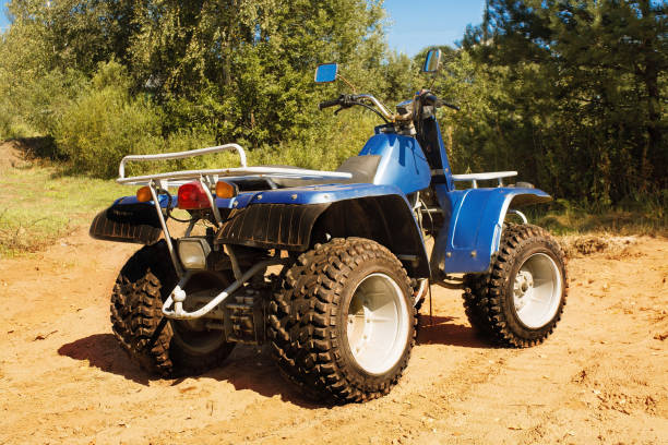 istock Blue quad on sand on the road, safari 1074264666