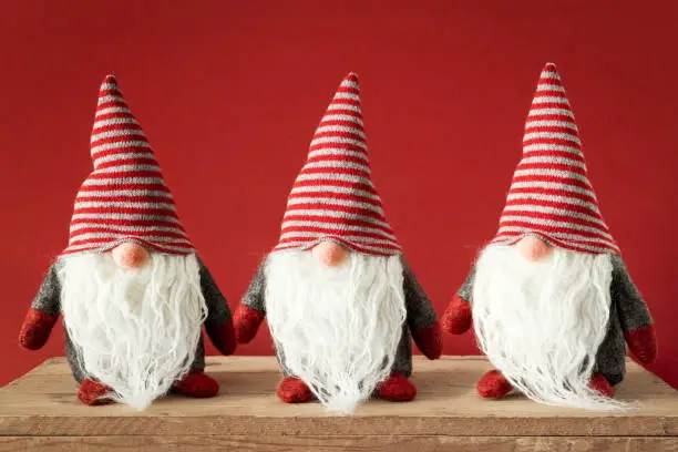 Photo of three Christmas gnomes with white beards