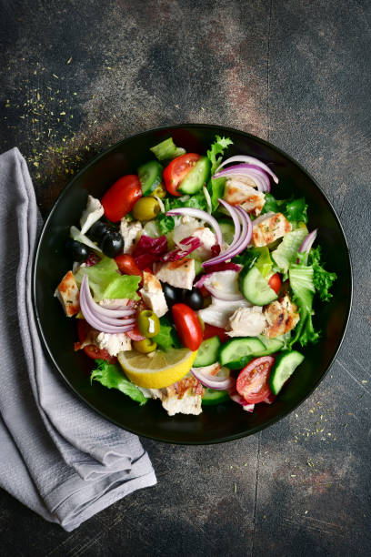 istock Vegetable salad with grilled chicken fillet 1074269792