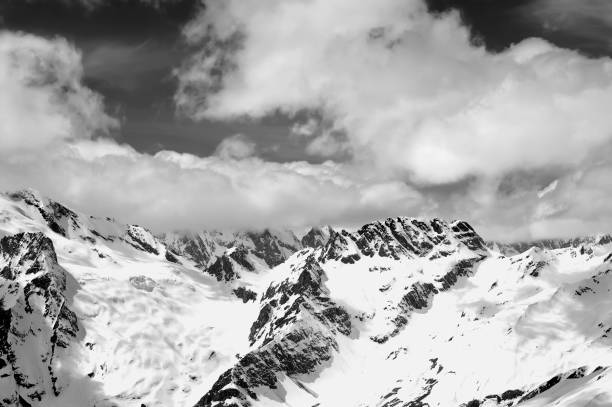 istock Snowy mountains in sun day 1074272214