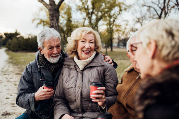 istock Old people having coffee to go outdoors 1074280516