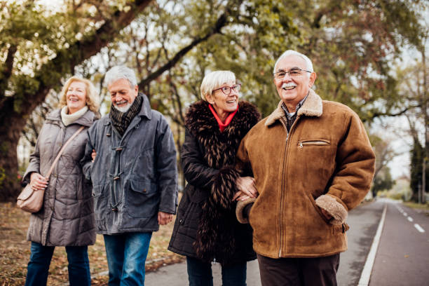 istock Senior couples in the park 1074280634