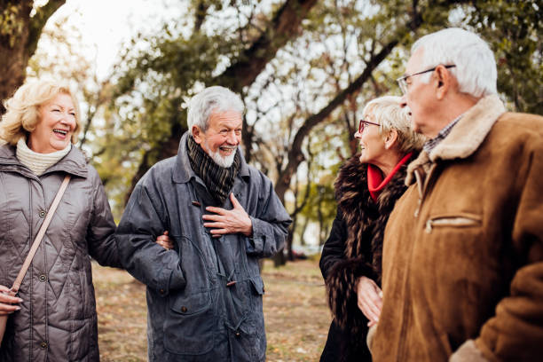 istock Smiling old people at the park 1074280692