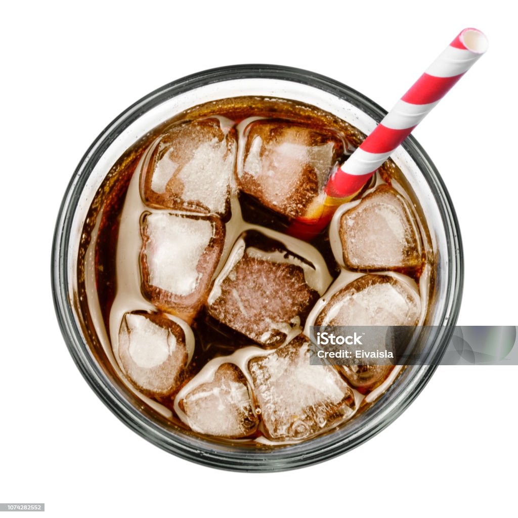 Fresh coke in glass, top view Fresh coke in glass, top view or high angle shot Coca Cola with ice and drinking straw, isolated on white background. Cola Stock Photo