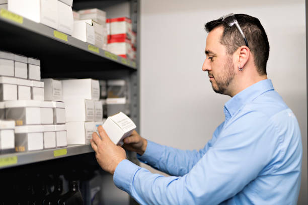 istock merchandiser checking products availibility for car repair 1074282714