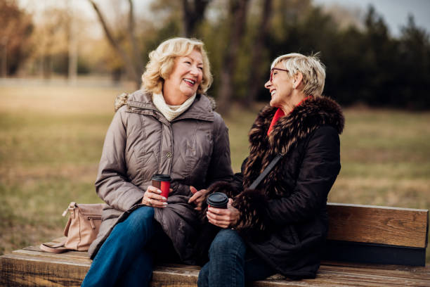 istock Happy women in the park 1074283970