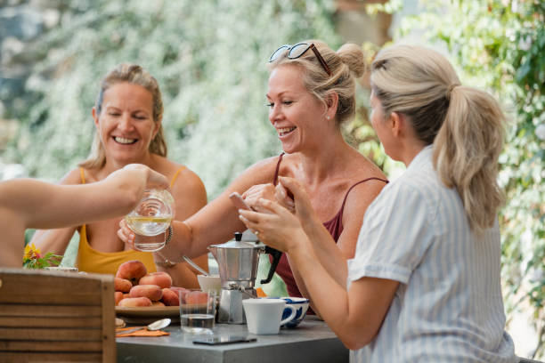 istock Mature Women Enjoying Holiday Breakfast 1074284128